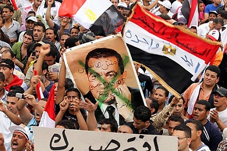 © epa Egyptian demonstrators in Tahrir Square 27 May 2011