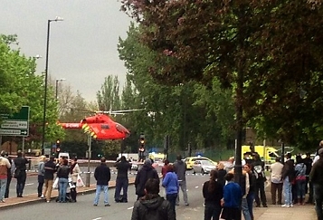 © EPA/YUSUF KAYALAR A air ambulance at the scene of a fatal incident in Woolwich, south east London