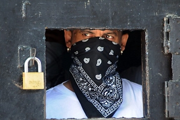© EPA/str Mara Salvatrucha member