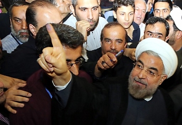 © EPA/ABEDIN TAHERKENAREH Hassan Rowhani