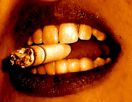 mouth holding cigarette