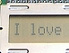 Ein LCD Display, auf dem "I love" steht.