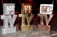 first, second and third place trophies for the UTV music video awards.
