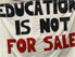 "education is not for sale", ein banner vor der akademie in wien