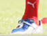 Bein mit Fußballschuh