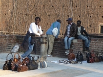 bag sellers in Milan - thoughtful