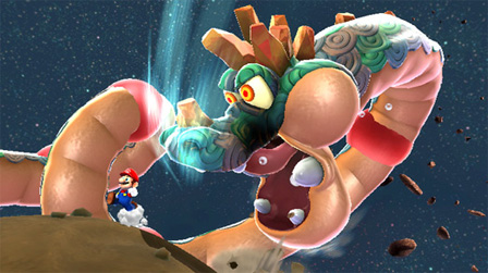 Ein Bildschirmfoto aus dem Videospiel "Super Mario Galaxy 2": Ein riesiger Drache greift Super Mario an.