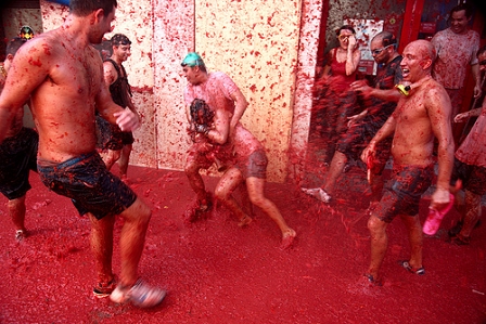 © Flydime, 2010 tomatina, tomato fight, red