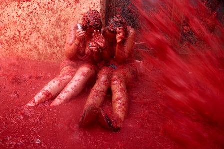© Flydime, 2010 tomatina, tomato fight, red
