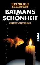 Cover des ROmans "Batmans Schönheit", auf dem einen brennende Kerze und ein Goldfisch zu sehen ist