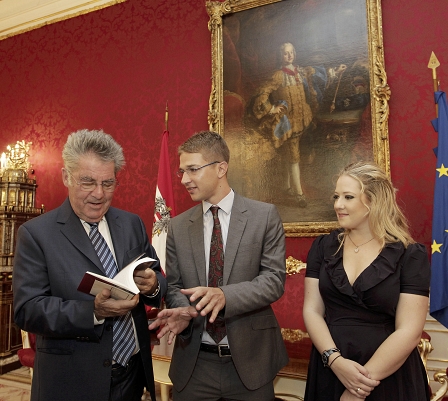 The President of Austria, Dr Heinz Fischer, receiving a copy of "Meine zwei Leben" by Lotte's grandchildren at the Hofburg Palace in Vienna.