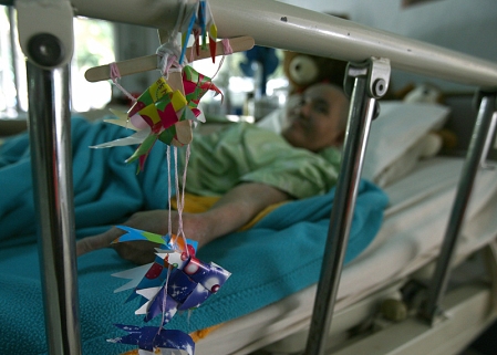 © EPA - NARONG SANGNAK Patient im Krankenbett