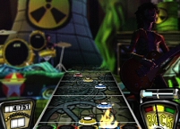 Bildschirmfoto aus dem Videospiel "Guitar Hero": Die fünf Spuren, auf denen die zu trefffenden "Noten" entgegenkommen.