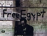 graffito "free egypt" und mann