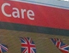 schild mit care und union jack 