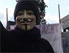 Demonstrant mit Guy Fawkes Maske