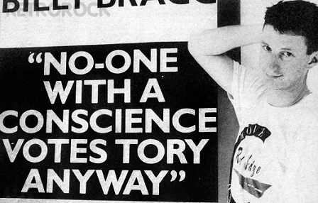 © public domain Billy Bragg vor Poster "No-one with a conscience votes Tory anyway"