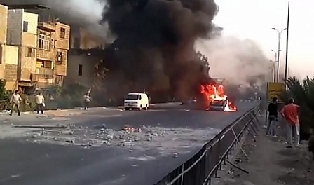 A vehicle on fire allegedly on the international road at Naher Aisha area of Damascus, Syria