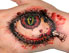 Augen-Tattoo auf der Hand