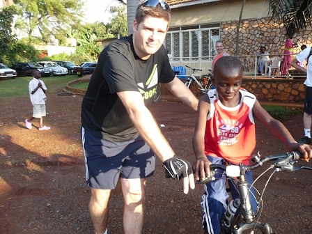 pushing a kid in Uganda!