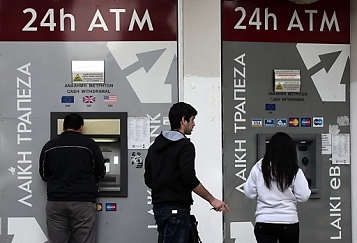 © EPA/KATIA CHRISTODOULOU Cyprus bank machines