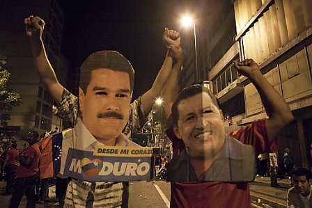 Supporters of interim President and presidential candidate, Nicolas Maduro, celebrate his election victory, in Caracas, Venezuela