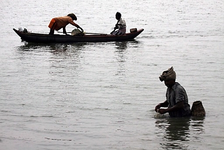 Sri Lankan fishermen resorting to a traditional canoe for fishing in the lagoon at Batticaloa which is 206 kms east of Colombo 