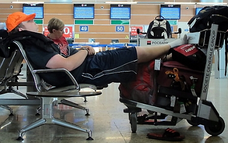 © apa A passenger sleeps waiting for his plane in Terminal D of the Sheremetyevo International airport in Moscow, Russia, 02 June 2013