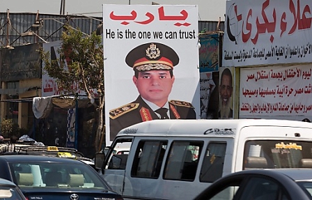 A huge placard depicting Egyptian army chief Abdel-Fattah al-Sisi is seen in Cairo, Egypt