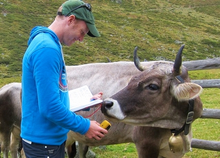 Chris and a cow