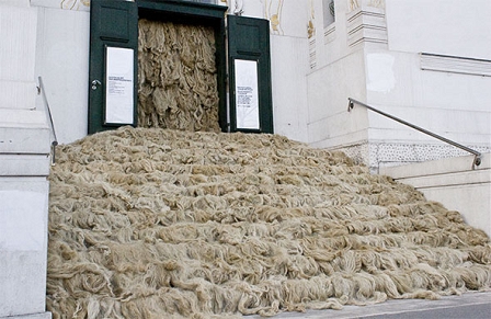 Wegen Schambehaarung geschlossen (Closed Because of Pubic Hair), monumental pavilion, plumber‘s hemp at the main entrance, table reservation (installation: Secession, Vienna, 2009)