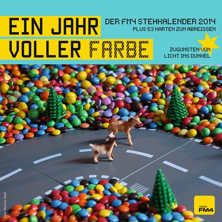 fm4 stehkalender 2014 cover - landschaft aus smarties mit rehfigur und lammfigur