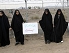 Female students protest at an Iranian nuclear facility demanding their nuclear rights