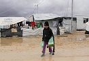 Syrian refugees face floods and freezing temperatures as winter sets in