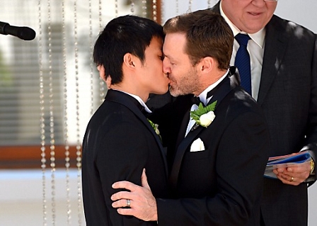 Ivan Hinton and Chris Tench kiss during their marriage in Canberra, Australia, 07 December 2013