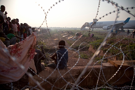 A cargo plane lands at Bangui airport bringing in 77 tons of supplies.