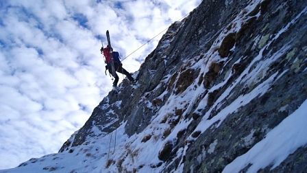 abseiling down