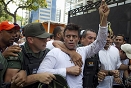 Leopoldo Lopez surrenders after addressing a rally in Caracas