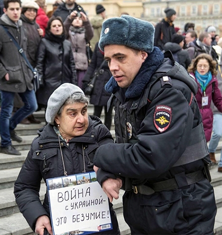 defenceless Grandma was taken by police today in RU because the placard "WAR WITH UKRAINE - MADNESS"