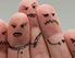 Finger mit aufgemalten Gesichtern