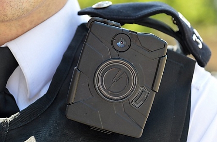 A Metropolitan Police handout photograph made in London, Britain shows a police officer wearing a body camera