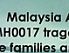 Bildschirm-Meldung zu Flug MH70 auf einem Flughafen