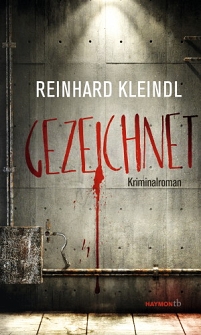 Das Cover zum Krimi "Gezeichnet" zeigt eine Betonwand mit Blutspuren