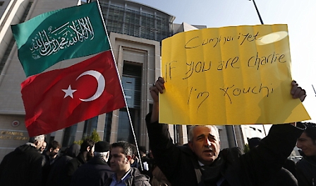 Protesters rally against Cumhuriyet Newspaper, during a protest in front of Istanbul Courthouse Headquarter, in Istanbul, Turkey, 15 January 2015. 

