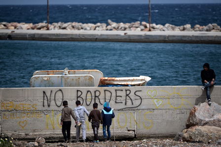 Refugee children at the coast near the open refugee camp of Souda